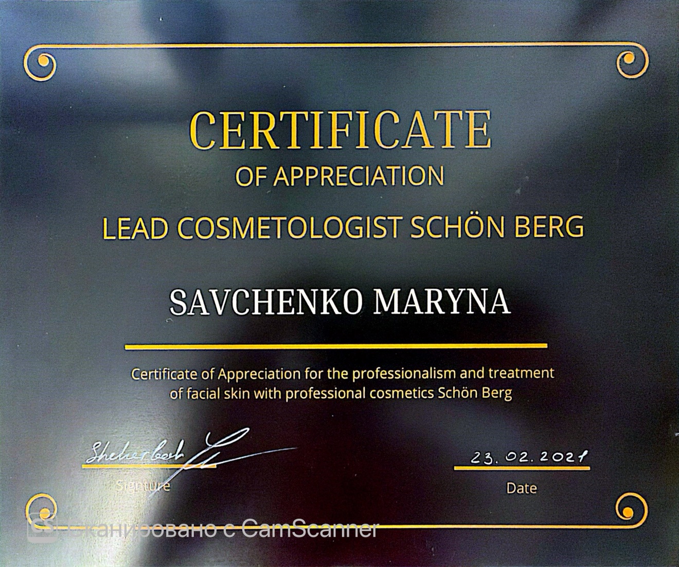 Schön Berg Certificate of Appreciation presented to Lead Cosmetologist Maryna Savchenko