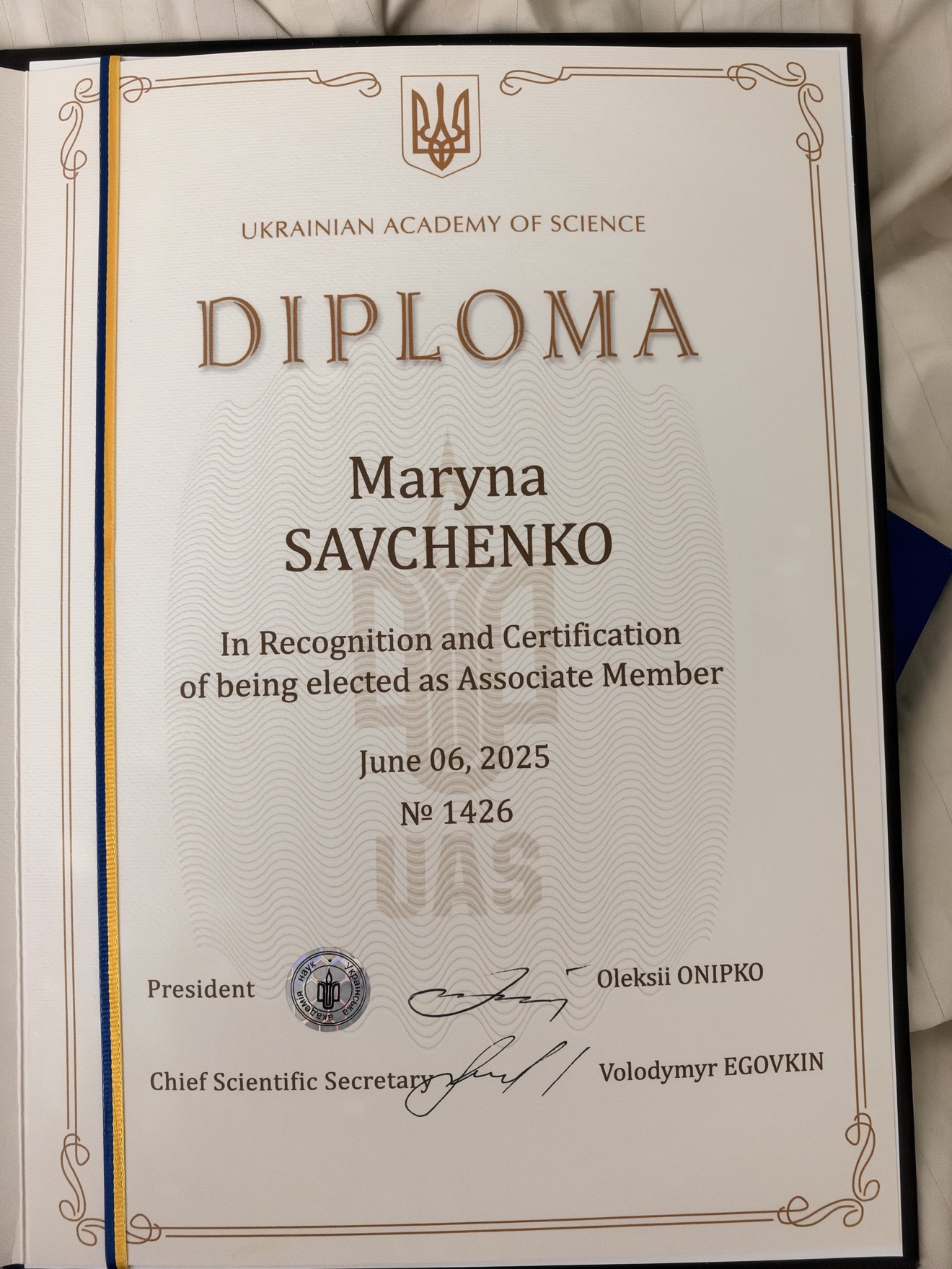 Diploma of Associate Member of the International United Academy of Sciences