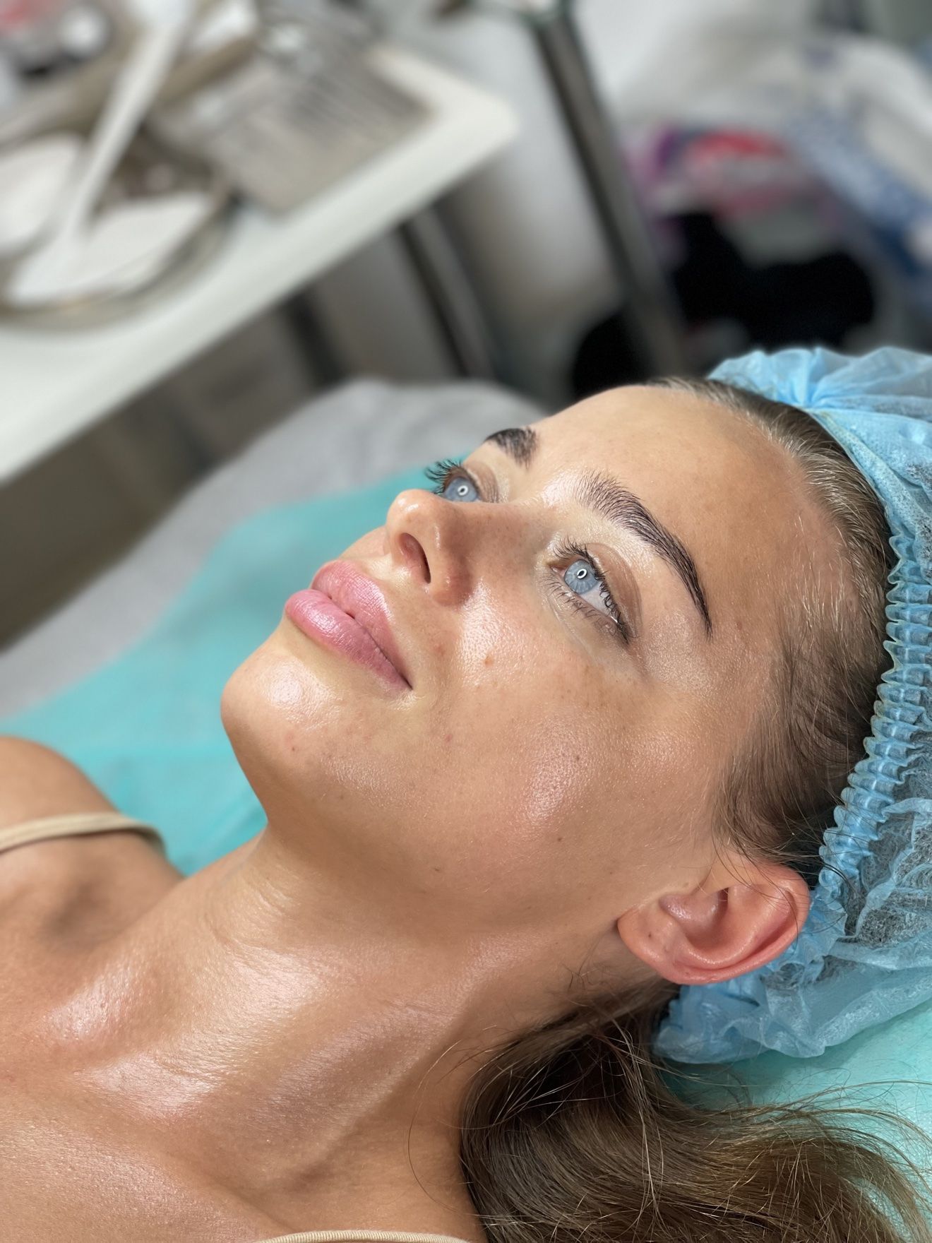 Client glowing skin after Maryna Savchenko facial treatment